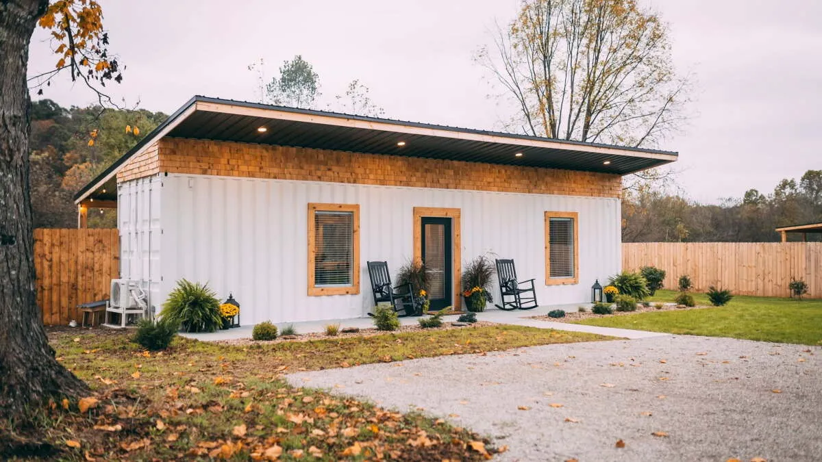 Shipping container transformed into cozy tiny house for two