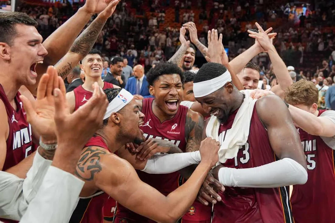 Miami Heat teammates celebrate center Bam Adebayo (13) after he scored 83 points, the second-highest single game total in NBA history, in an NBA basketball game against the Washington Wizards, Tuesday, March 10, 2026, in Miami.