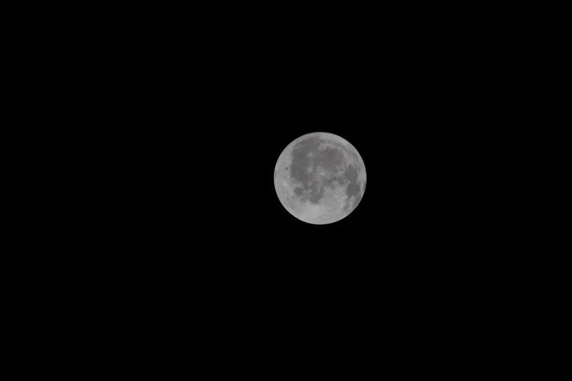 A view of the moon taken by one of the Artemis II's four crew members through the window of the Orion spacecraft on the third day of the NASA mission.