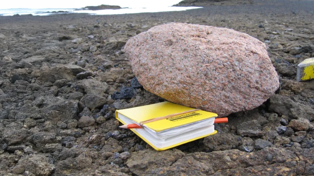 Strange pink rocks just helped find a secret 100km giant hidden under Antarctica