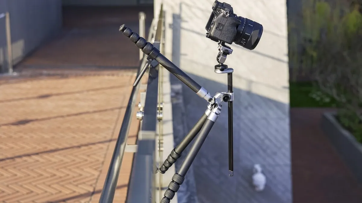 Adaptable carbon tripod is designed to hang out wherever needed