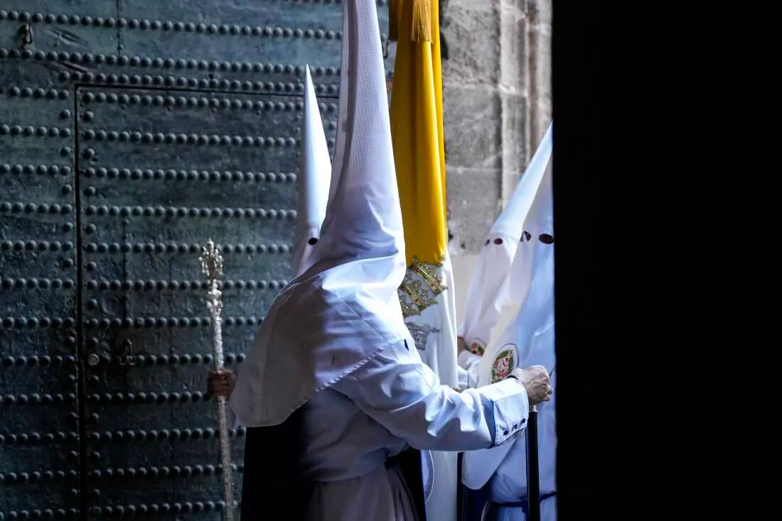 Members of the Brotherhood of Los Negritos wear the pointed hoods traditionally worn in Semana Santa processions. To the American eye, they recall Ku Klux Klan costumes but date much farther back than the American hate group.