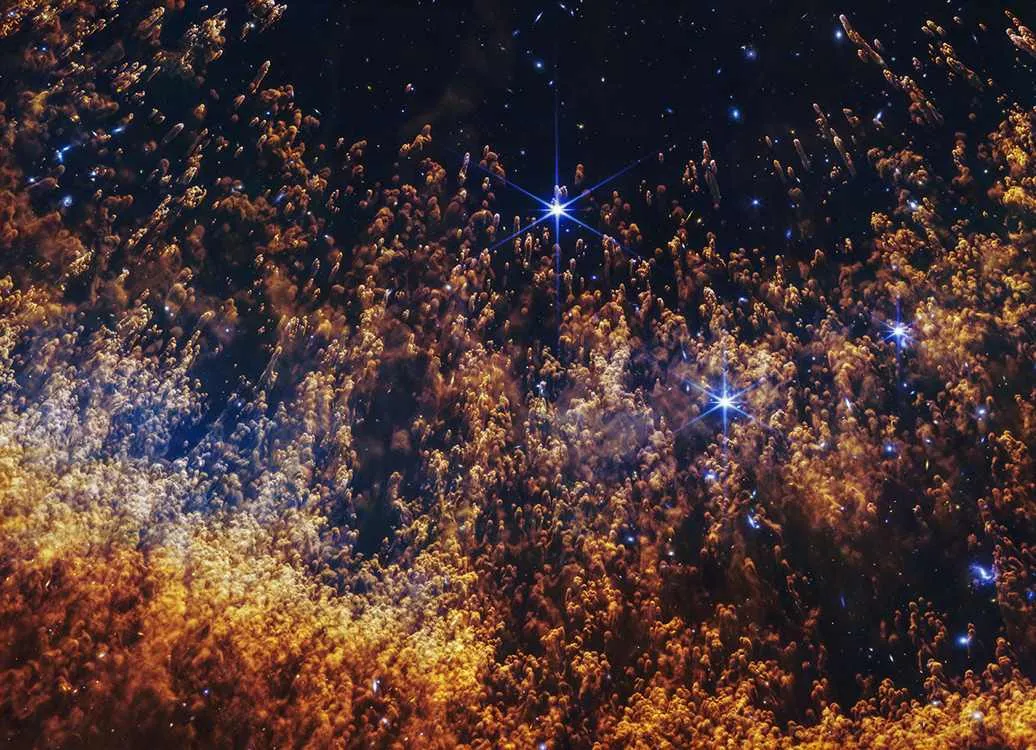 Star’s Final Breath Appears Like Columns of Smoke in Breathtaking New James Webb Image