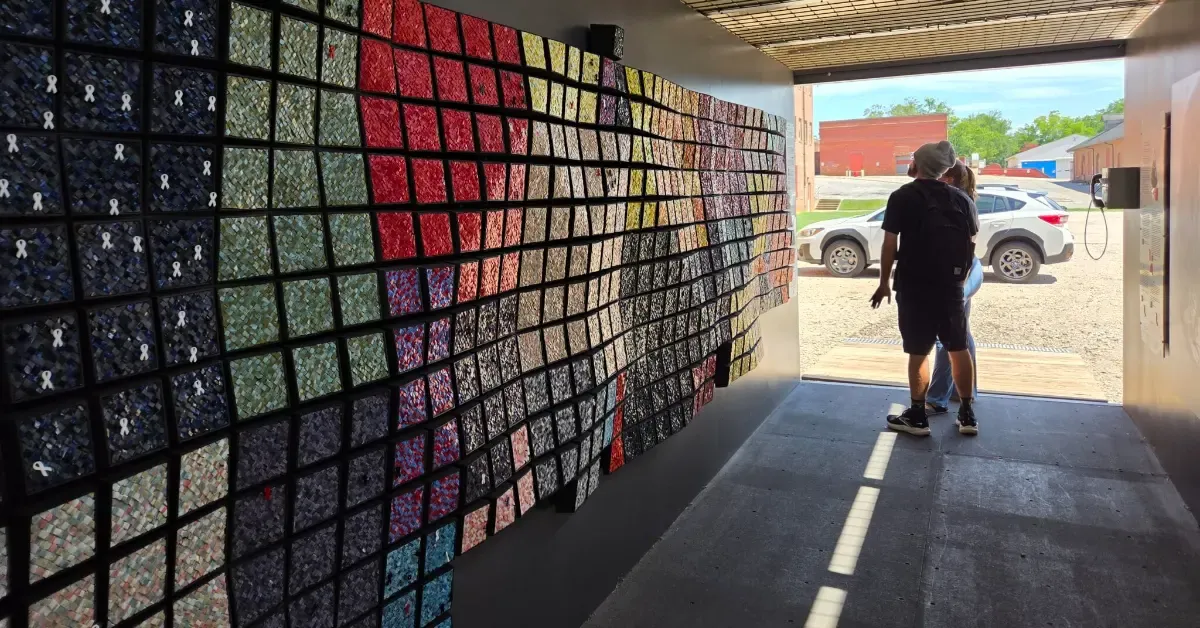 Art gallery inside of a shipping container highlights the need for women's prison reform