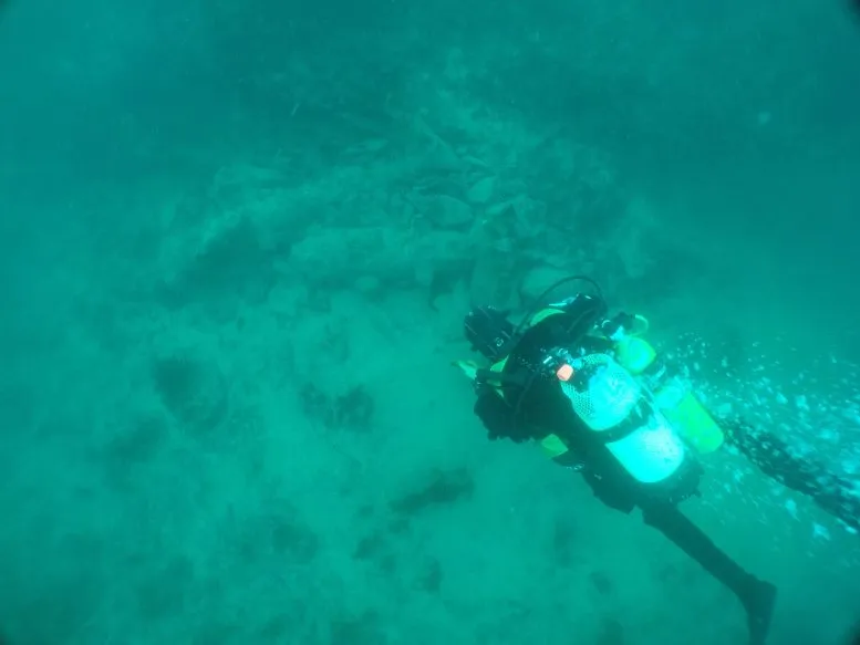 Diver Surveys the Dom Van Keulen Shipwreck Site