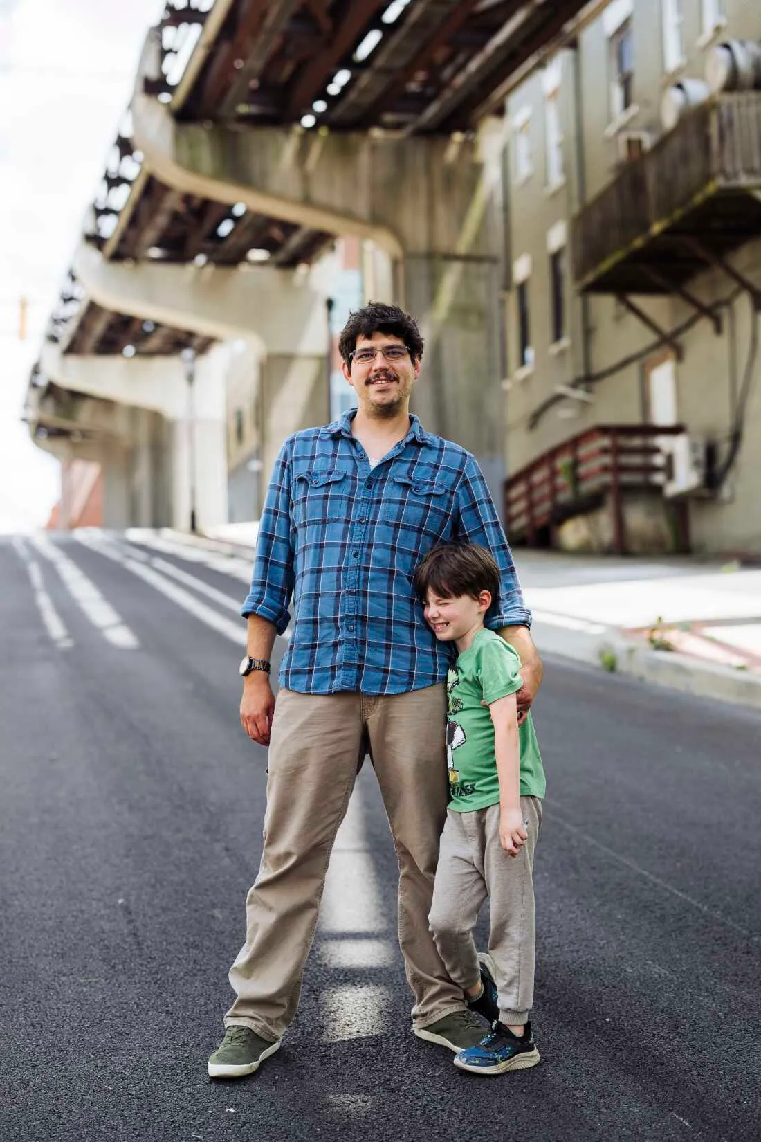 Chipper Thurber and his son, Bowen, 5, in Morgantown, W.Va. Thurber moved his family from Jamestown, Pa. to West Virginia and initially thought the relocation incentives were "too good to be true."