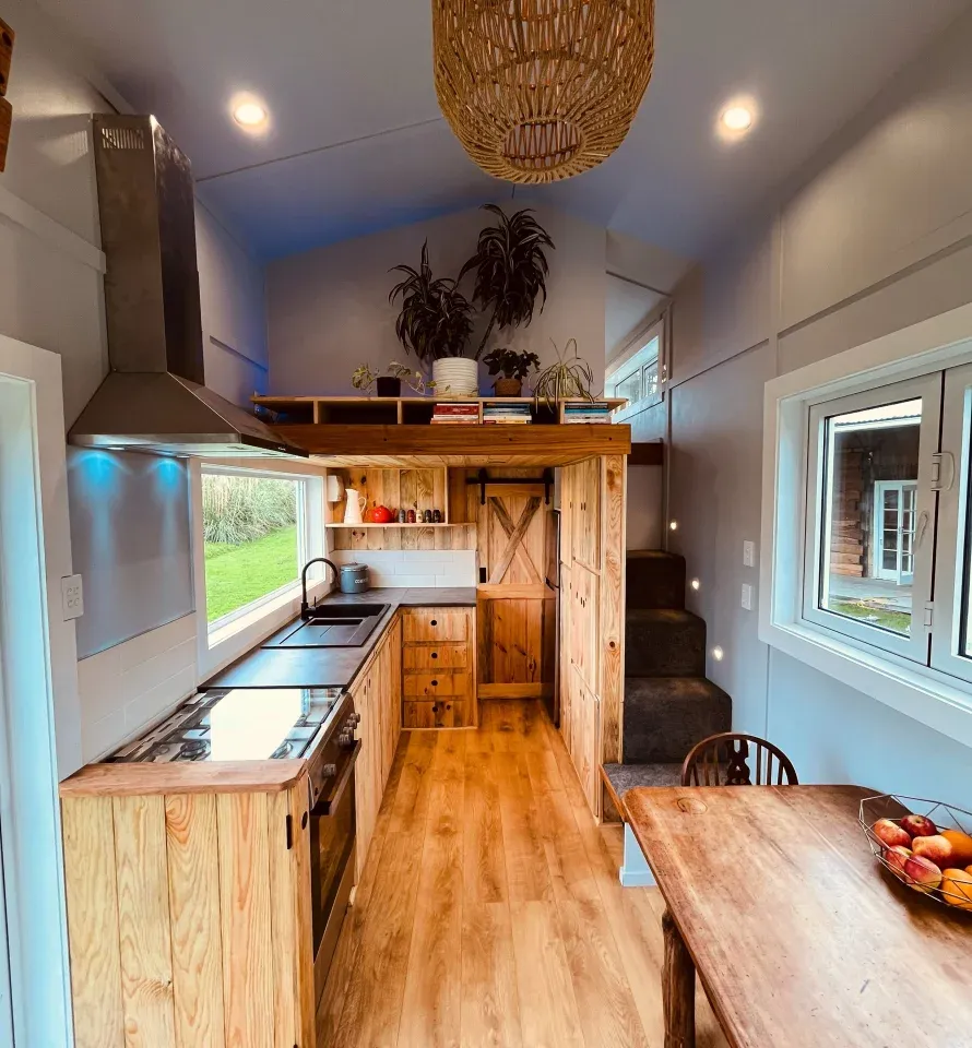 The Maple's interior includes knotty timber cabinetry and detailing