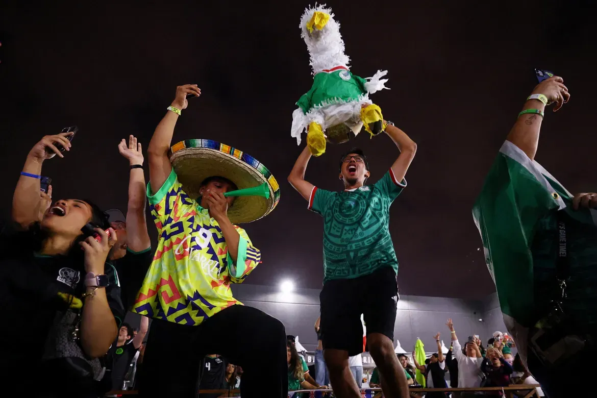 Mexico fans celebrate at a watch party in Boyle Heights, Los Angeles, after the match.
