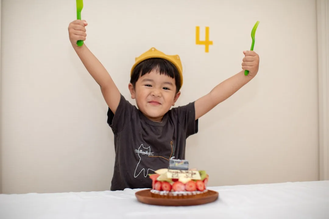 Boy stands with Guinness World Record award