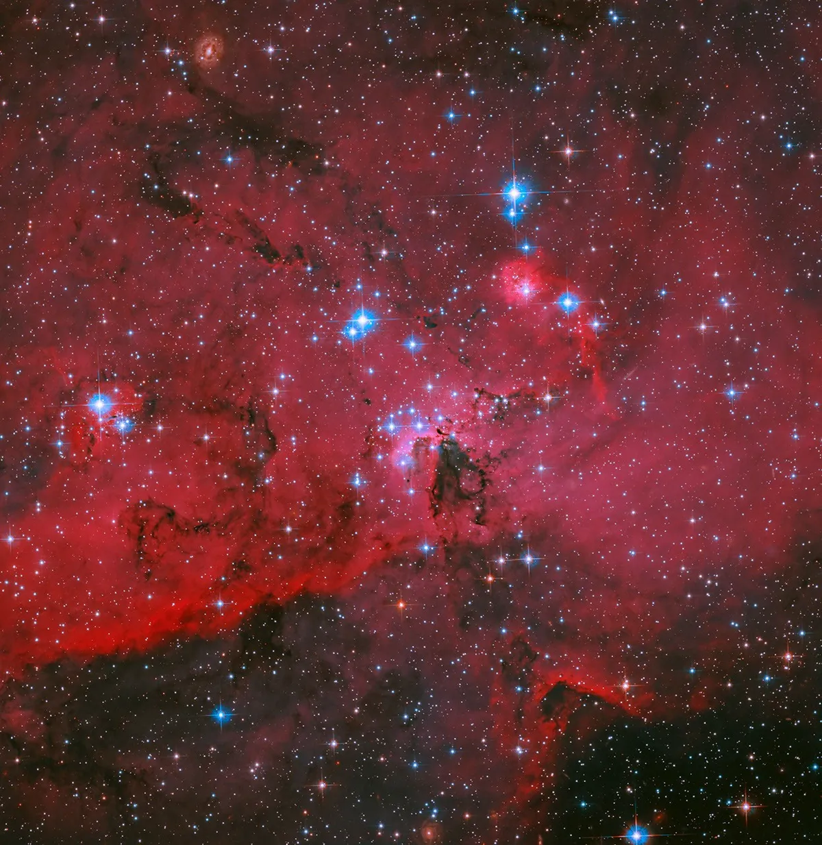 A Crimson Cloud of Baby Stars Just Blew Scientists' Minds
