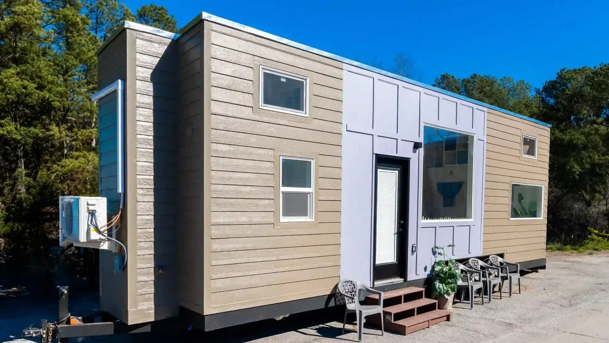 Family friendly tiny house packs three bedrooms into 32-ft layout
