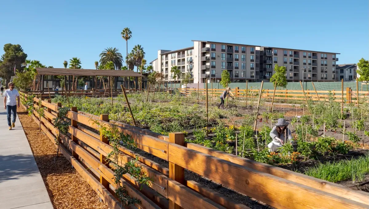 A gardener works in the garden at the heart of the