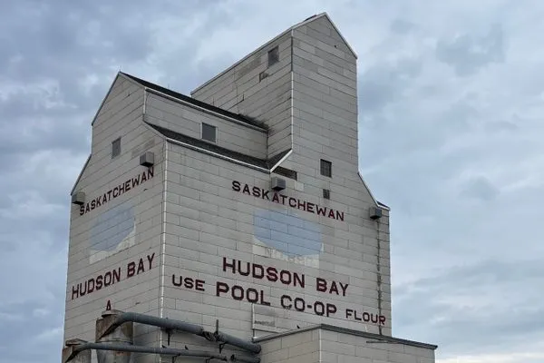 A wooden grain elevator keeps prairie farming history alive