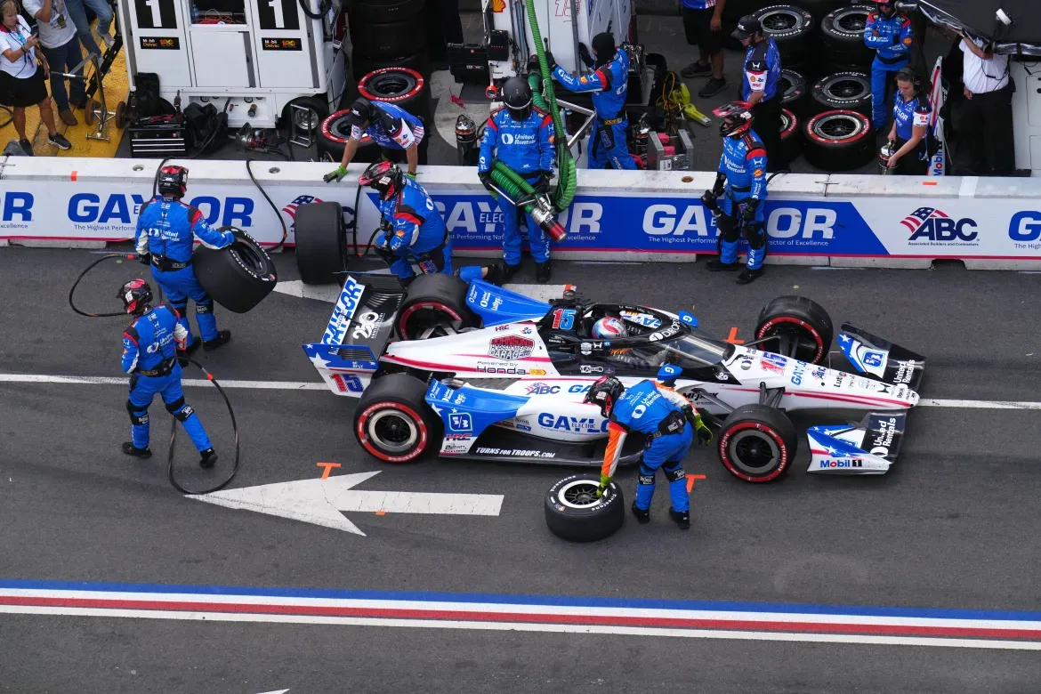 Race car driver Graham Rahal takes a pit stop during the race.