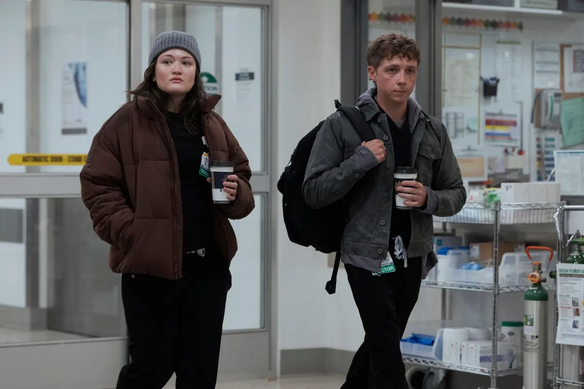 Picture of two medical staff holding coffees
