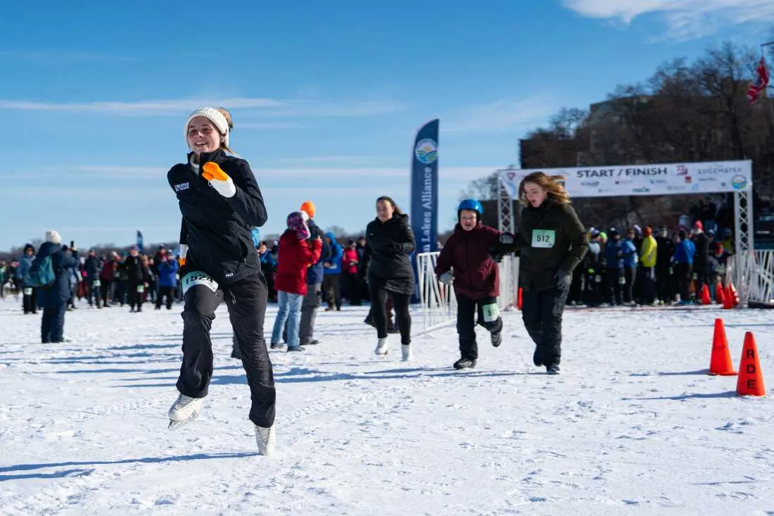 A competitor runs in ice skates during a 5K during the Frozen Assets Festival on Lake Mendota on Feb. 7 in Madison, Wis.
