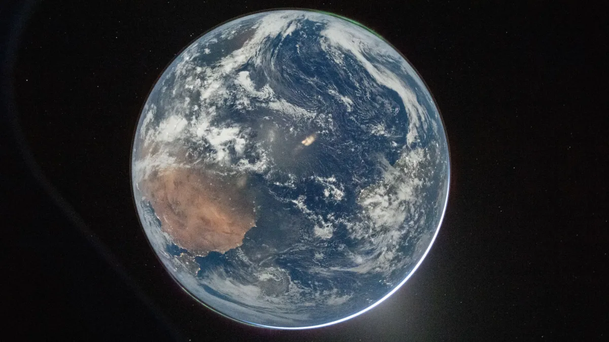 Artemis II crew snaps stunning portrait of Earth on their way to the moon