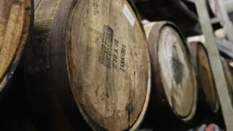 Barrels containing distiller Maya Pistola Agavepura.