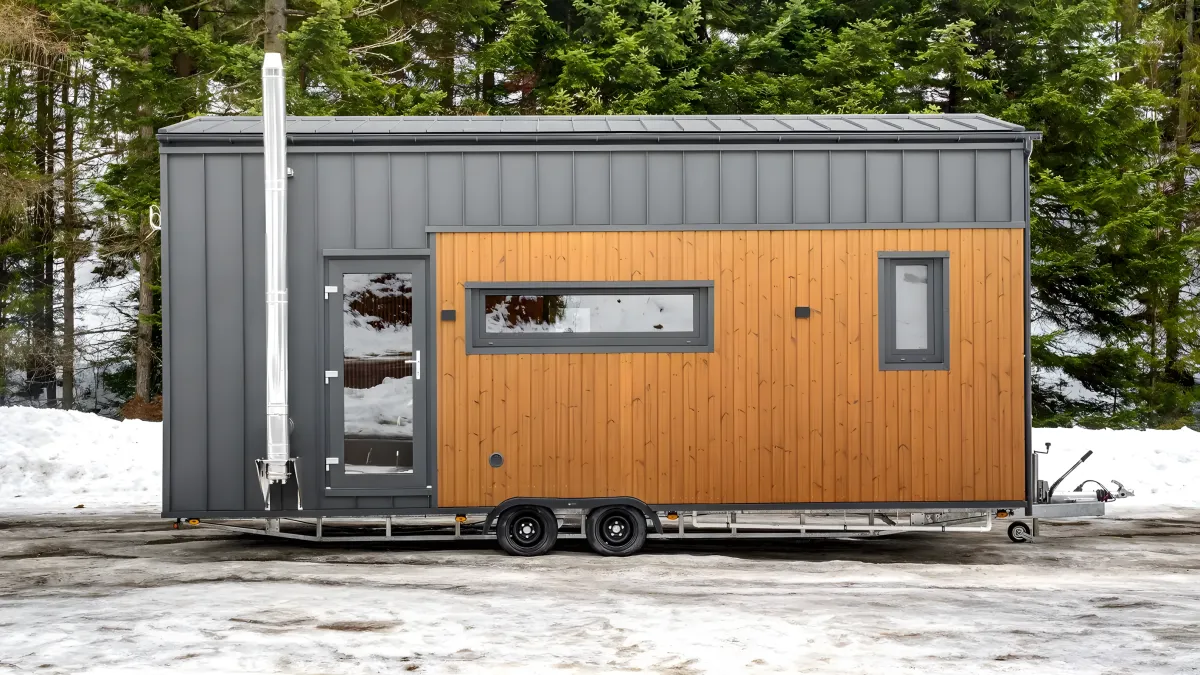 Off-grid-capable tiny house packs flexible living into road-ready frame
