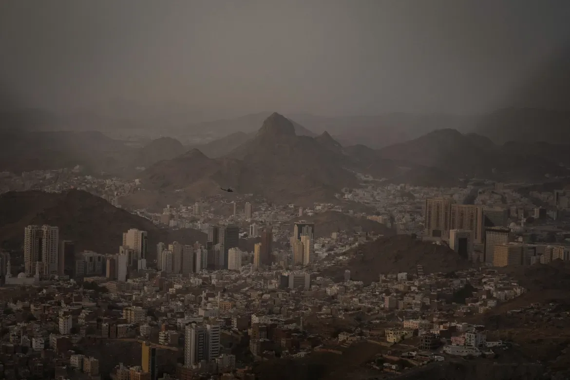 A military helicopter patrols during the annual Hajj pilgrimage at the holy city of Mecca, Saudi Arabia.