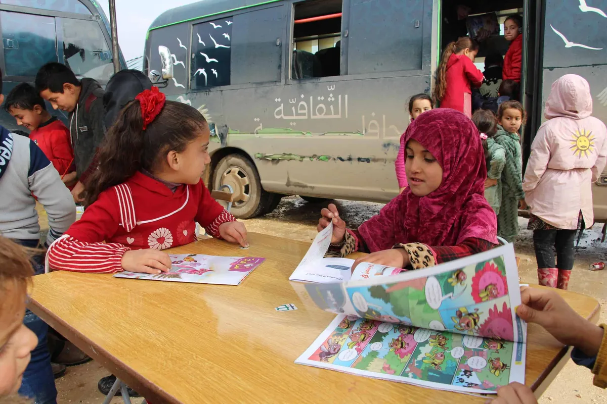 This Bright Bus Is Bringing Books and Joy to Syria's Children