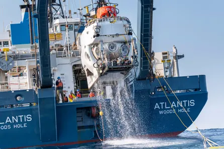 The human-occupied submersible Alvin being recovered to the research vessel Atlantis.