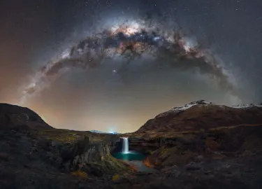 This image was captured at Salto del Agrio, in the province of Neuquén, Argentina.The 45 metre waterfall plunges into a canyon carved by ancient lava flows from the Copahue volcano. Surrounded by basalt, the scene is enriched by the vivid colours left behind by minerals, particularly iron and sulfur carried by the Agrio River