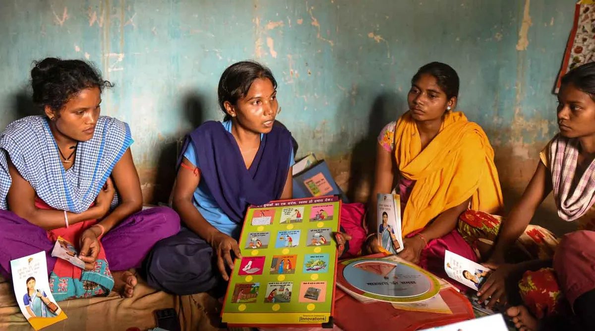 Four women in India discuss reproductive health with Ipas